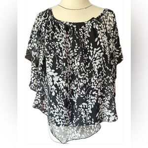 Size M two layered black and white blouse.